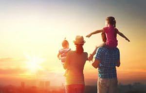 Family in front of a sunset - Ascent Capital - Real Estate Funding Solutions